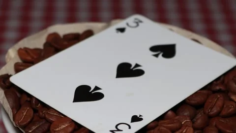 The ceramic coffee brewing the core coffees inside and the playing cards Stock Footage 253815331