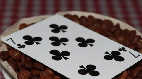 The ceramic coffee brewing the core coffees inside and the playing cards Stock Footage 253815553