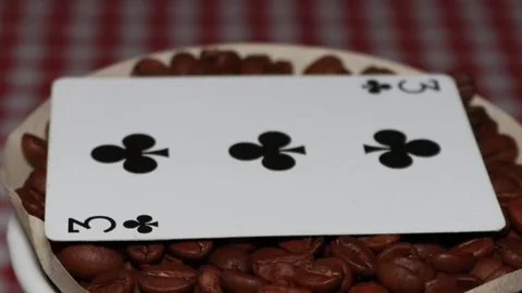 The ceramic coffee brewing the core coffees inside and the playing cards Stock Footage 253815886