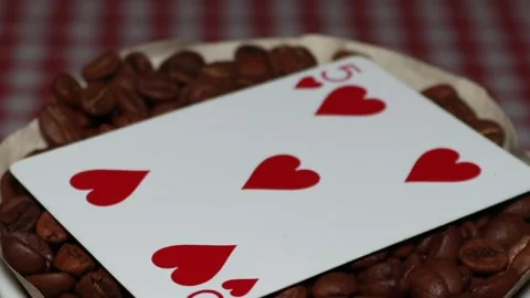 The ceramic coffee brewing the core coffees inside and the playing cards Stock Footage 253816048