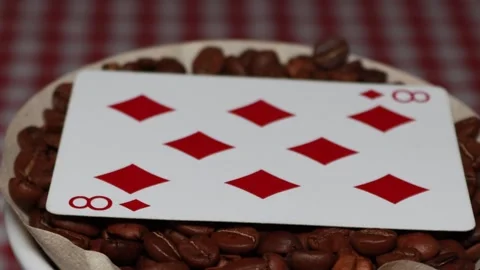 The ceramic coffee brewing the core coffees inside and the playing cards Stock Footage 253816158