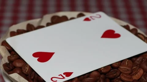 The ceramic coffee brewing the core coffees inside and the playing cards Stock Footage 253816246