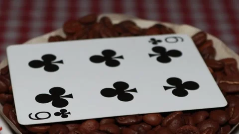 The ceramic coffee brewing the core coffees inside and the playing cards Stock Footage 253816388