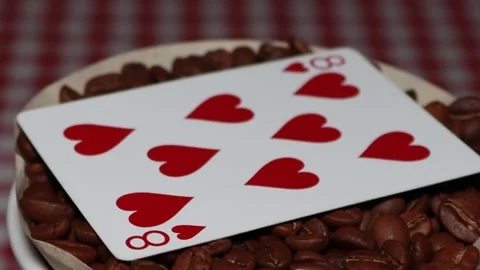 The ceramic coffee brewing the core coffees inside and the playing cards Stock Footage 253816549