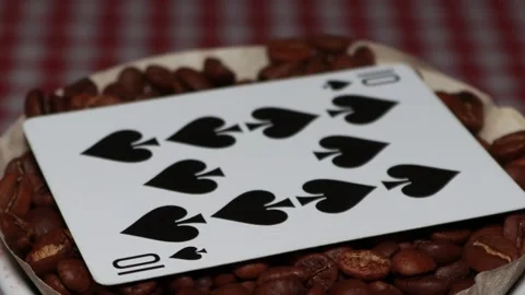 The ceramic coffee brewing the core coffees inside and the playing cards Stock Footage 253816745