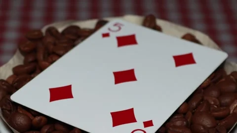 The ceramic coffee brewing the core coffees inside and the playing cards Stock Footage 253816812