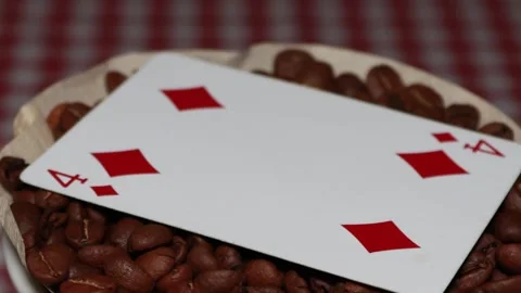 The ceramic coffee brewing the core coffees inside and the playing cards Stock Footage 253816877