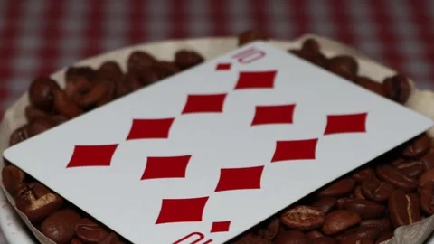 The ceramic coffee brewing the core coffees inside and the playing cards Stock Footage 253816949