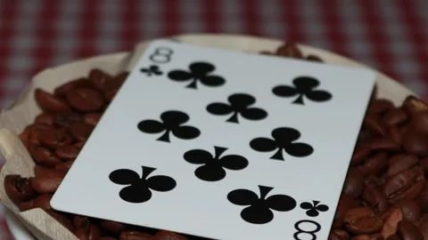 The ceramic coffee brewing the core coffees inside and the playing cards Stock Footage 253816992