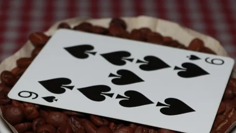The ceramic coffee brewing the core coffees inside and the playing cards Stock Footage 253817043