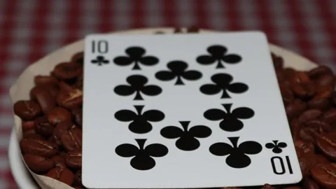 The ceramic coffee brewing the core coffees inside and the playing cards Stock Footage 253817274