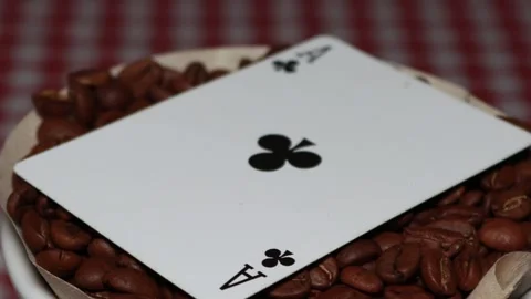 The ceramic coffee brewing the core coffees inside and the playing cards Stock Footage 253817335