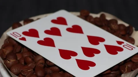 The ceramic coffee brewing the core coffees inside and the playing cards Stock Footage 253817375