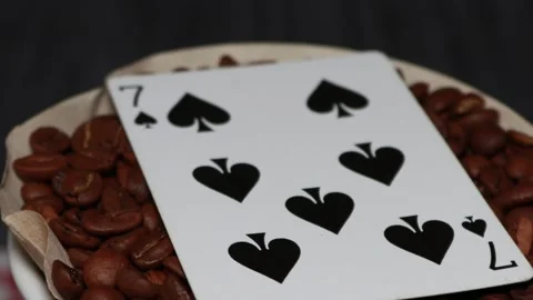 The ceramic coffee brewing the core coffees inside and the playing cards Stock Footage 253817390