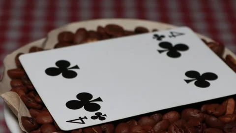 The ceramic coffee brewing the core coffees inside and the playing cards Stock Footage 253817467