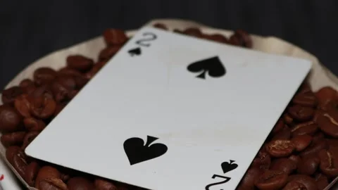 The ceramic coffee brewing the core coffees inside and the playing cards Stock Footage 253817483