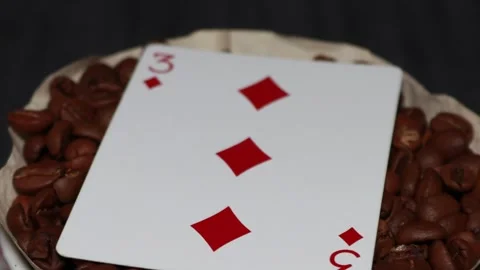 The ceramic coffee brewing the core coffees inside and the playing cards Stock Footage 253817489