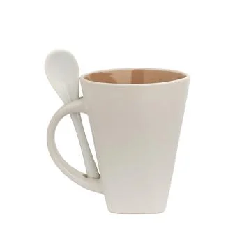 Ceramic cup and ceramic spoon isolated on white background close up Stock Photos