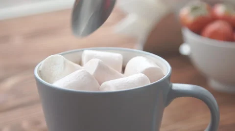Ceramic cup of hot brown cacao stands on wooden table Stock Footage 68954585
