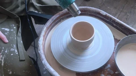 Ceramic cup on on pottery wheel, Close up, top view. 스톡 동영상 291697191