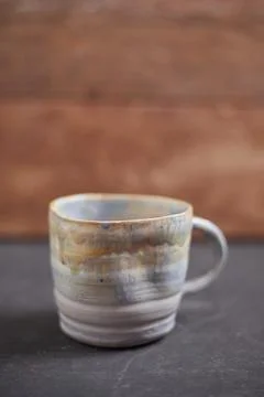 Ceramic cup on rustic background Stock Photos