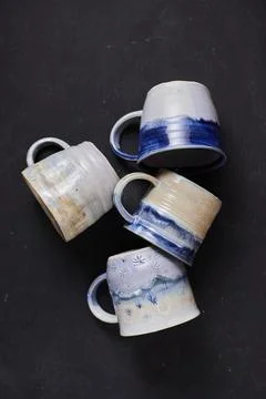 Ceramic cup on rustic background Stock Photos