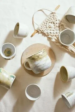 Ceramic cup on a textile Stock Photos