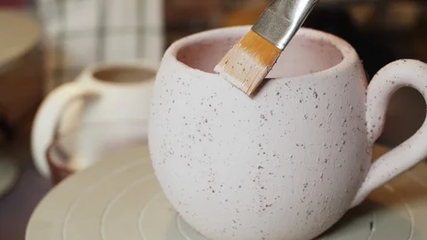 Ceramic cup on a turntable 스톡 동영상 106982427