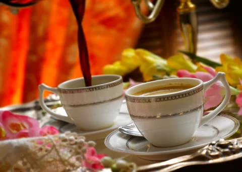 Ceramic cups of steaming hot coffee Stock Photos