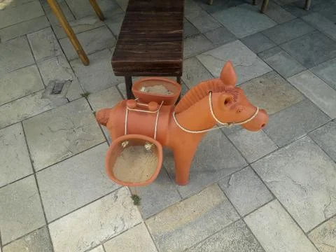 Ceramic donkey at the floor on Flat Resort, Pernambuco, Brazil. Stock Photos
