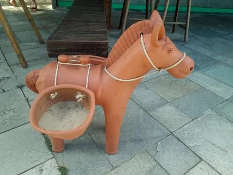 Ceramic donkey at the floor on Flat Resort, Pernambuco, Brazil. Stock Photos