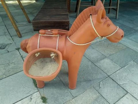 Ceramic donkey at the floor on Flat Resort, Pernambuco, Brazil. Stock-Fotos