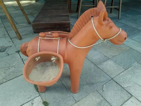 Ceramic donkey at the floor on Flat Resort, Pernambuco, Brazil. Stock Photos