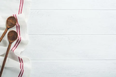 Ceramic empty white plate. Rustic vintage set of white plate, wooden spoon on Stock Photos