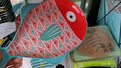 Ceramic Fish Plates Displayed in a House Ware Store Stock Footage 159288115