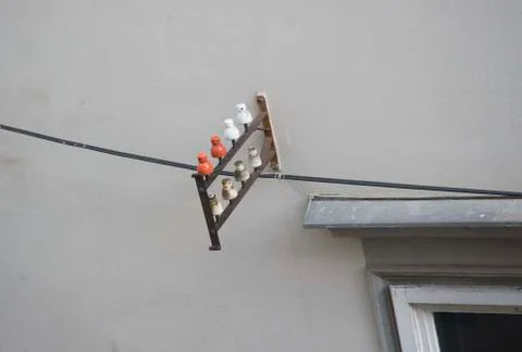 Ceramic insulator mounted on building Stock Photos