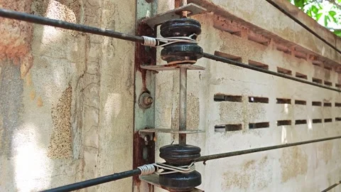 Ceramic insulators suggesting electrical infrastructure. Stock Footage 306996102