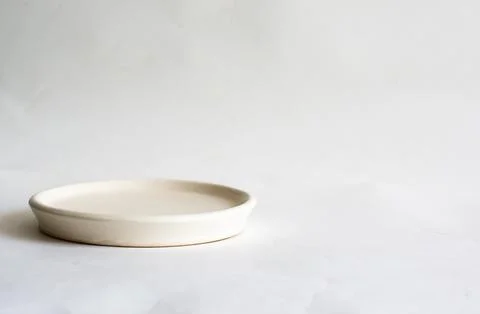 Ceramic light stand on a light background, for composition Stock Photos