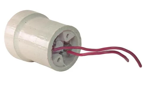 Ceramic lightbulb socket with red-crimson connection wires. Industrial devi.. Stock Photos