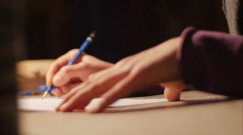 Ceramic maker designing artwork with pencil in her atelier extreme close-up Stockbeeldmateriaal 61950022