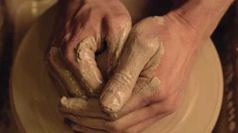 Ceramic molding class male hands shaping clay pot Stock Footage 125920220