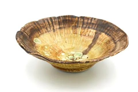 Ceramic plate on white background Stock Photos