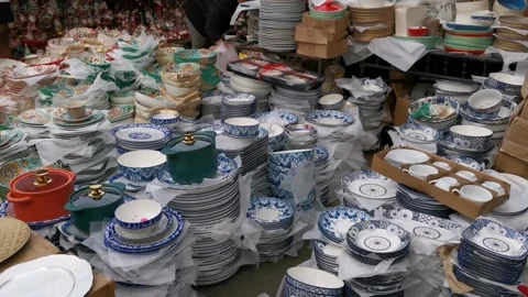 Ceramic Plates and Dishware Sold in a Store in the Street Stock Footage 166714060
