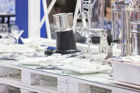 Ceramic plates and elegant cups Stock Photos