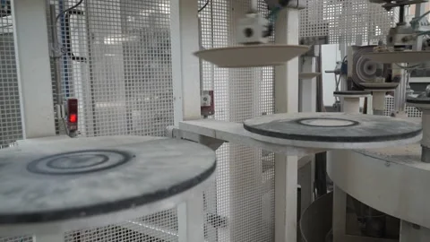 Ceramic plates on a conveyor.  Craft process Video stock 256479914