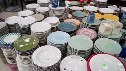 Ceramic plates neatly arranged in a stack Stock Footage 320958581