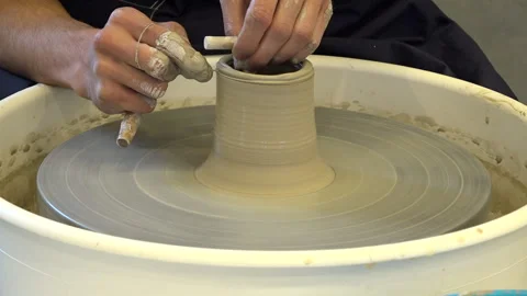Ceramic pot on a potter's wheel. Making a ceramic pot Stock Footage 260508495