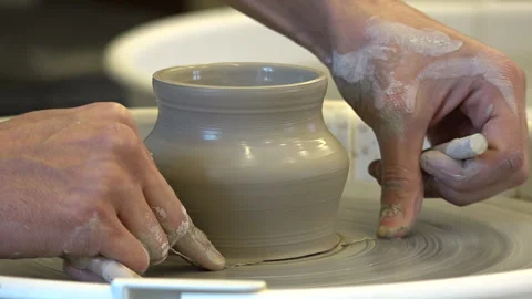 Ceramic pot on a potter's wheel. Making a ceramic pot Stock Footage 260508567