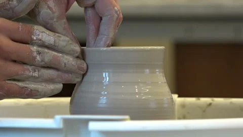 Ceramic pot on a potter's wheel. Making a ceramic pot Stock Footage 260508580
