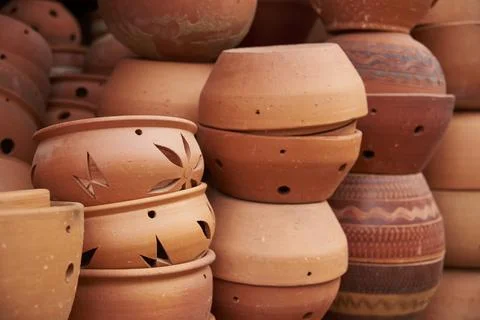 Ceramic pottery pots with different designs stacked, in Raquira, Colombia Stock Photos